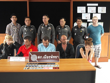 Four Bulgarians and a German have been arrested for allegedly stealing 20 million baht from Siam Commercial Bank ATMs with counterfeit electronic cards.